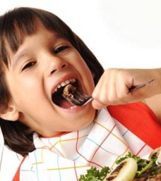 How should a school age child be fed?